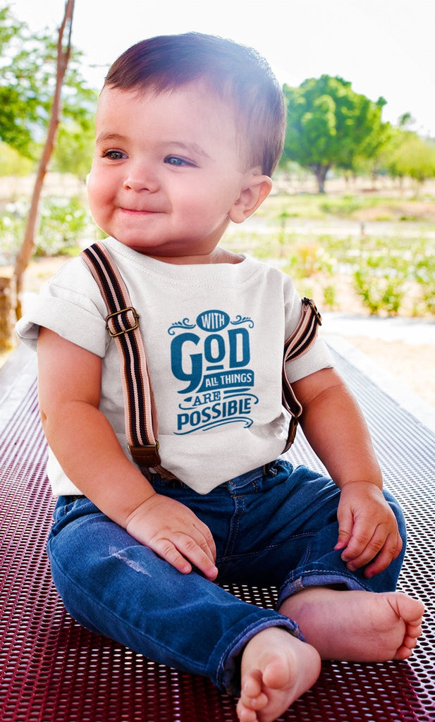 With God - Baby’s T -  Heather Columbia Blue / 6-12m, Heather Columbia Blue / 12-18m, Heather Columbia Blue / 18-24m, Pink / 6-12m, Pink / 12-18m, Pink / 18-24m, White / 6-12m, White / 12-18m, White / 18-24m -  Trini-T Ministries