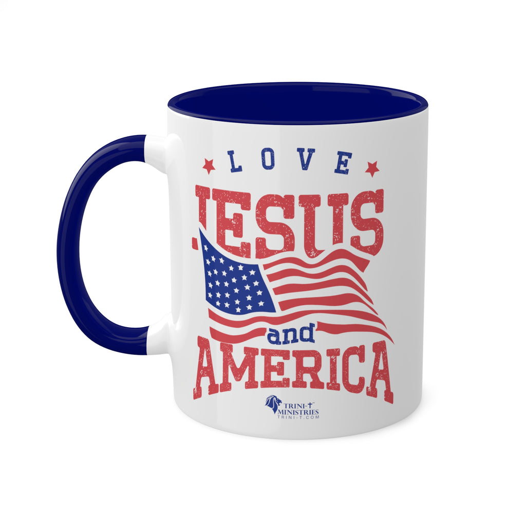 11oz White Mug with blue handle and interior handle on the left. Celebrate your faith and patriotism every morning with our "Love Jesus and America" 11oz Mug. This Christian Patriotic Ceramic Coffee Cup features a bold American flag design and the heartfelt message "Love Jesus and America," perfect for showing your love for God and country.