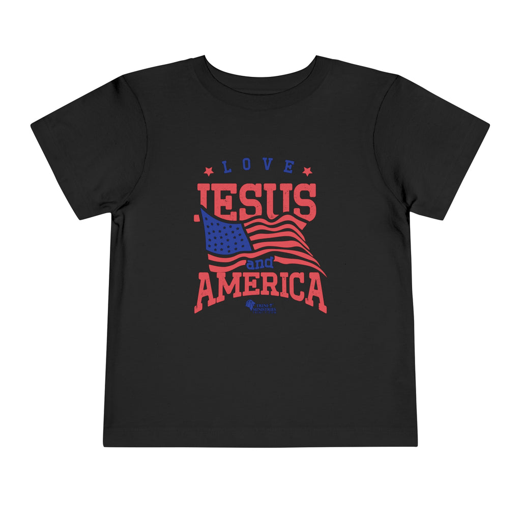 Black Trini-T Ministries' Love Jesus and America Bella+Canvas 3001T shirt. Get our "Love Jesus and America" Toddler T-Shirt to let your toddler display their faith and patriotism. This delightful and motivating graphic tee is ideal for parents, relatives, and friends who wish to spread the Word of God and express their love for America through their toddler's clothing.