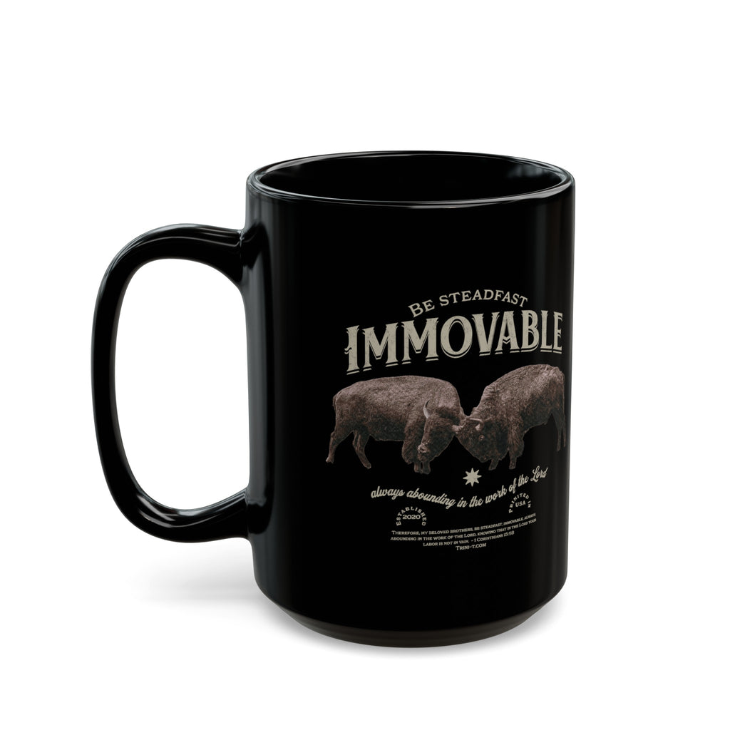 Trini-T Ministries Steadfast and Immovable - 1 Corinthians 15:53 Design on Black Mug 15oz handle on left against white background