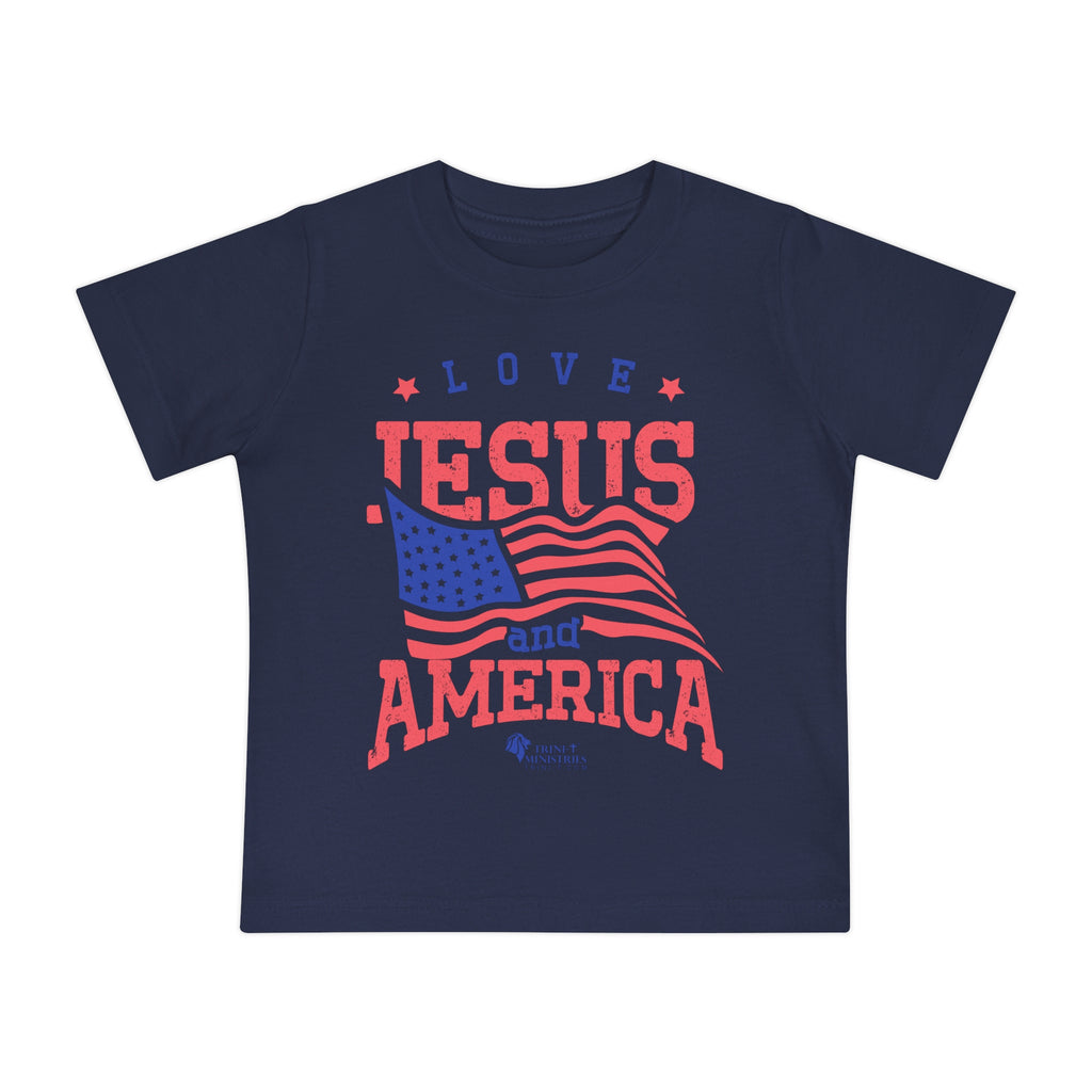 Navy Blue Baby's Tee with Love Jesus and America design from Trini-T Ministries. Dress your little one in the perfect blend of faith and patriotism with our "Love Jesus and America Too" baby t-shirt. This adorable and inspirational graphic tee is ideal for parents, relatives, and friends who want to share the word of God and celebrate their love for America through their baby's outfit.