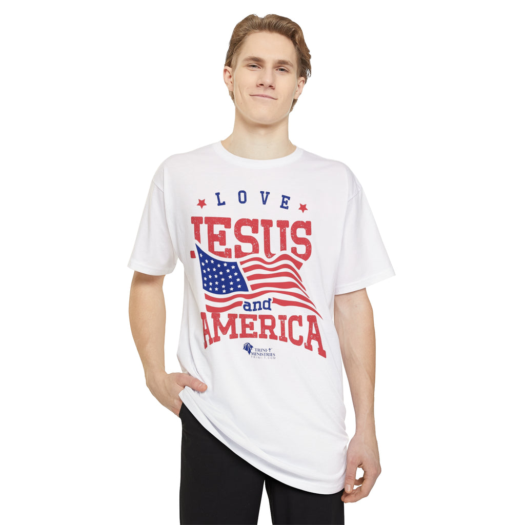 Model wearing White Tee with Love Jesus and America design on Bella+Canvas 3006 Long Urban Tee. Elevate your streetwear game with our "Love Jesus and America" Long-body Urban Tee. This trendy graphic tee is designed for patriots who want to blend faith and fashion, and make a bold statement. Whether it’s for yourself or as a gift for a friend or family member, this shirt is ideal for showcasing your love for Jesus and America in a modern, urban style.
