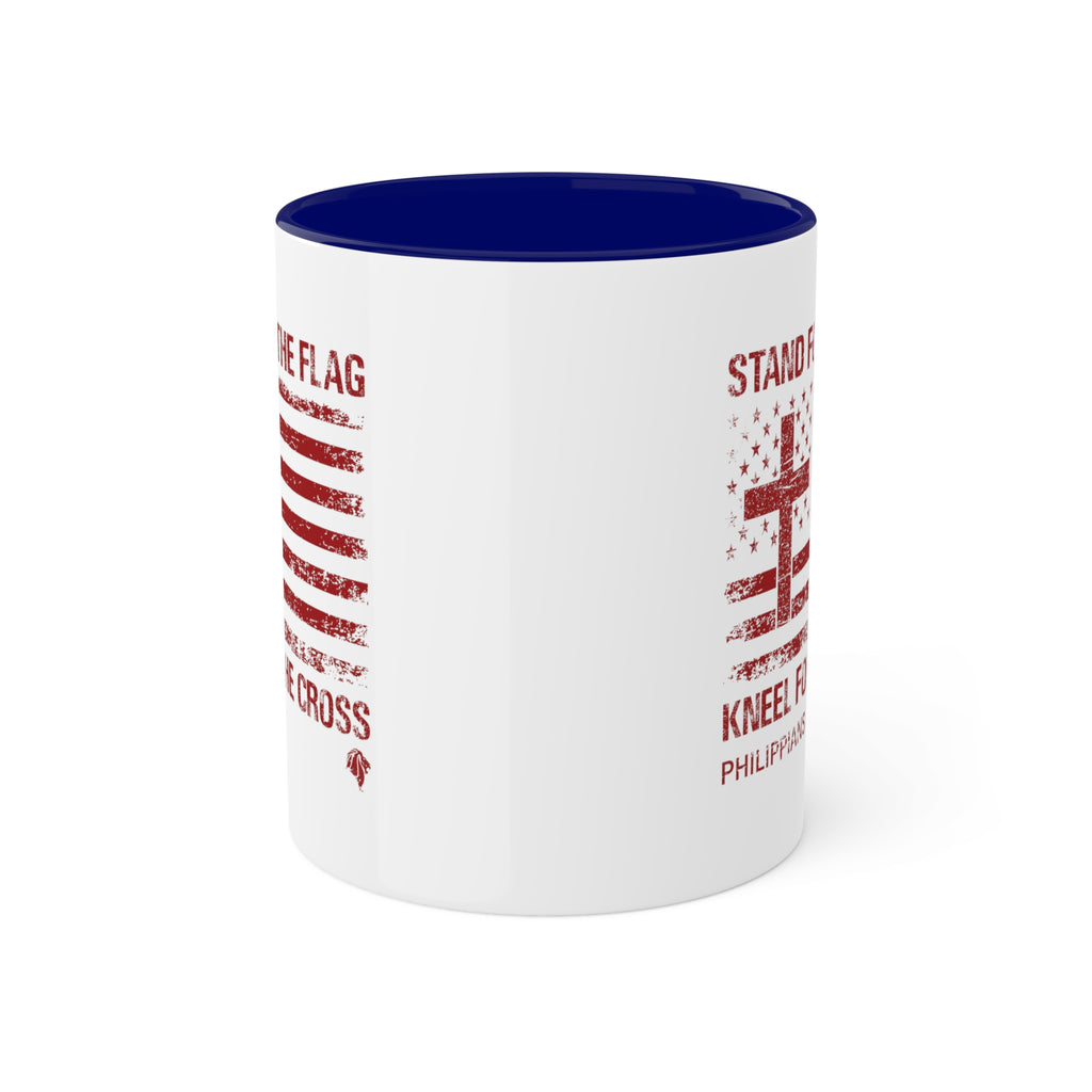 Kneel for the Cross blue accented mug from Trini-T Ministries with the handle on the back.  Celebrate your faith and patriotism with our "Kneel For The Cross" Patriotic Christian Mug. This 11oz ceramic coffee cup is perfect for Christians who love to share the Word of God, honor the cross, and express their love for their country. Featuring a bold and inspiring design, this mug is an excellent addition to your morning routine or quiet time.