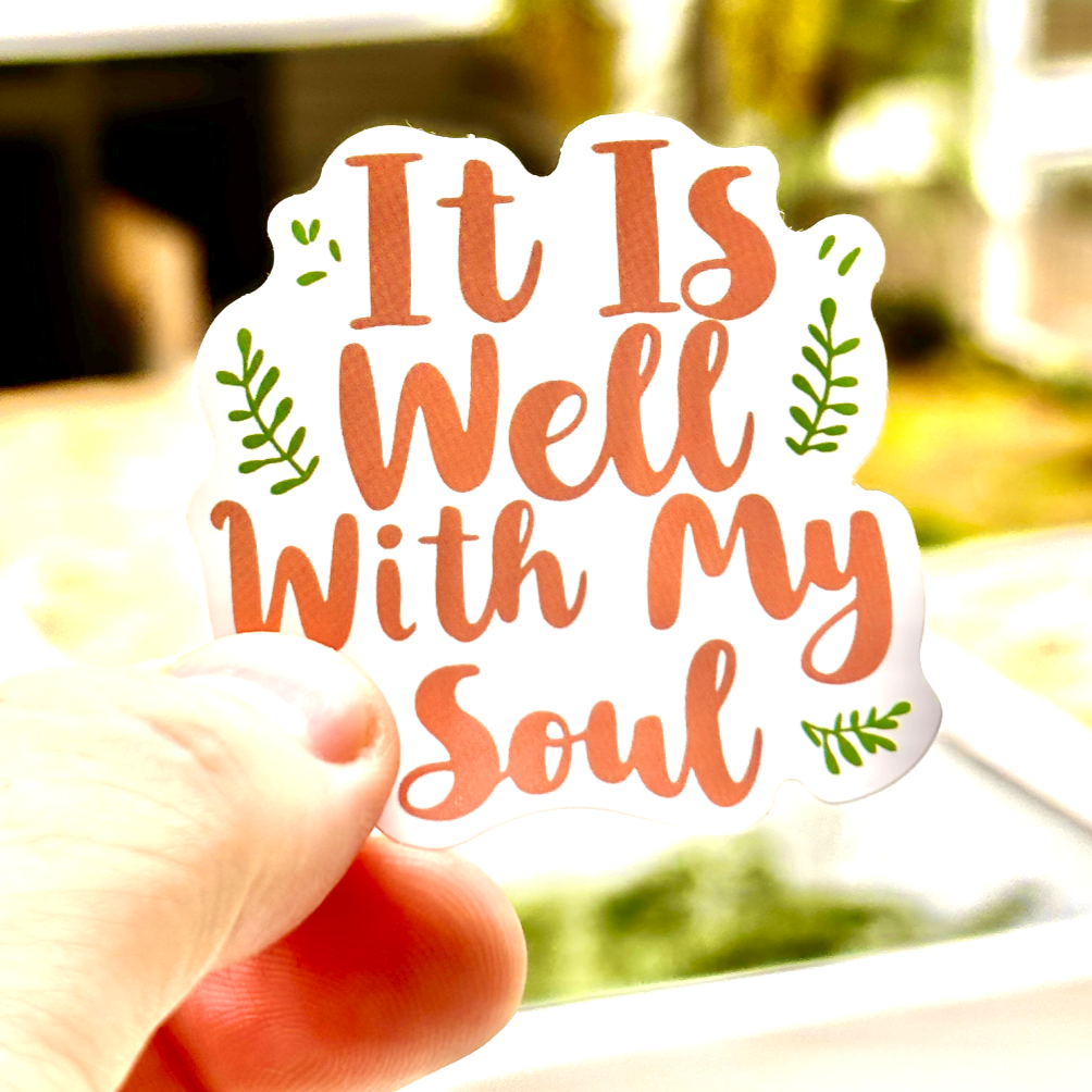 Christian sticker with the Bible verse, 'It is well with my soul.' - Psalm 42:27 surrounded by green leaves in a beautiful Boho aesthetic. Perfect for adding a touch of faith to your journal, laptop, or water bottle, this sticker inspires peace in the LORD.