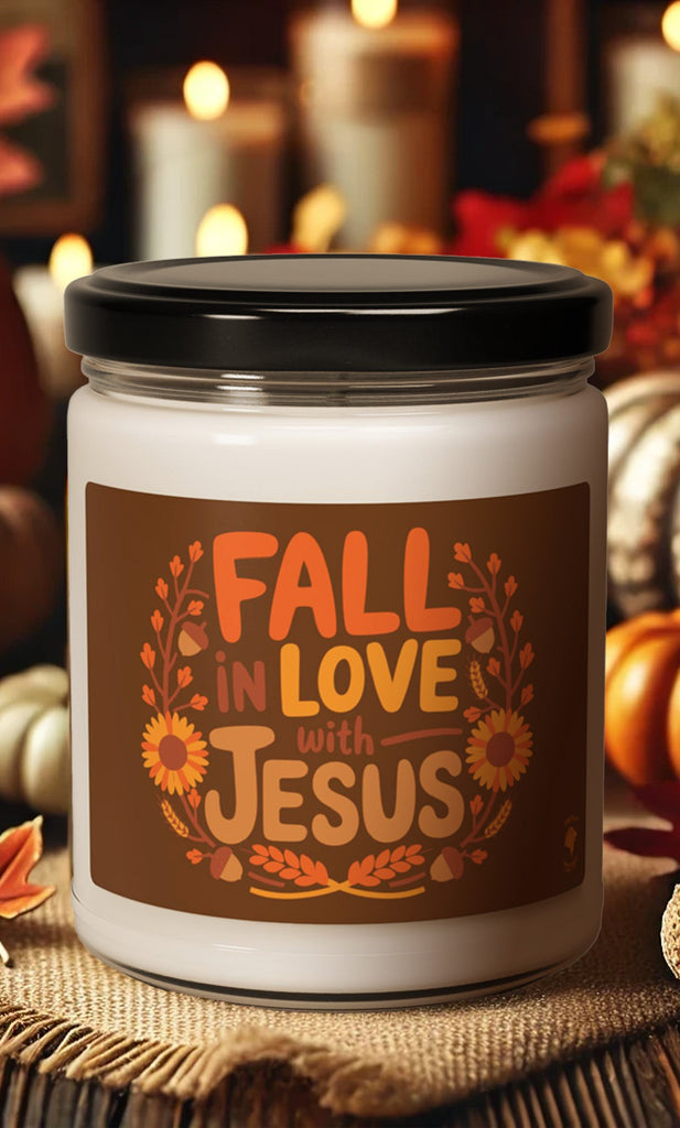 Fall in Love with Jesus soy candle surrounded by pumpkins and autumn decor, Christian fall-themed candle with Apple Harvest scent or scentless.