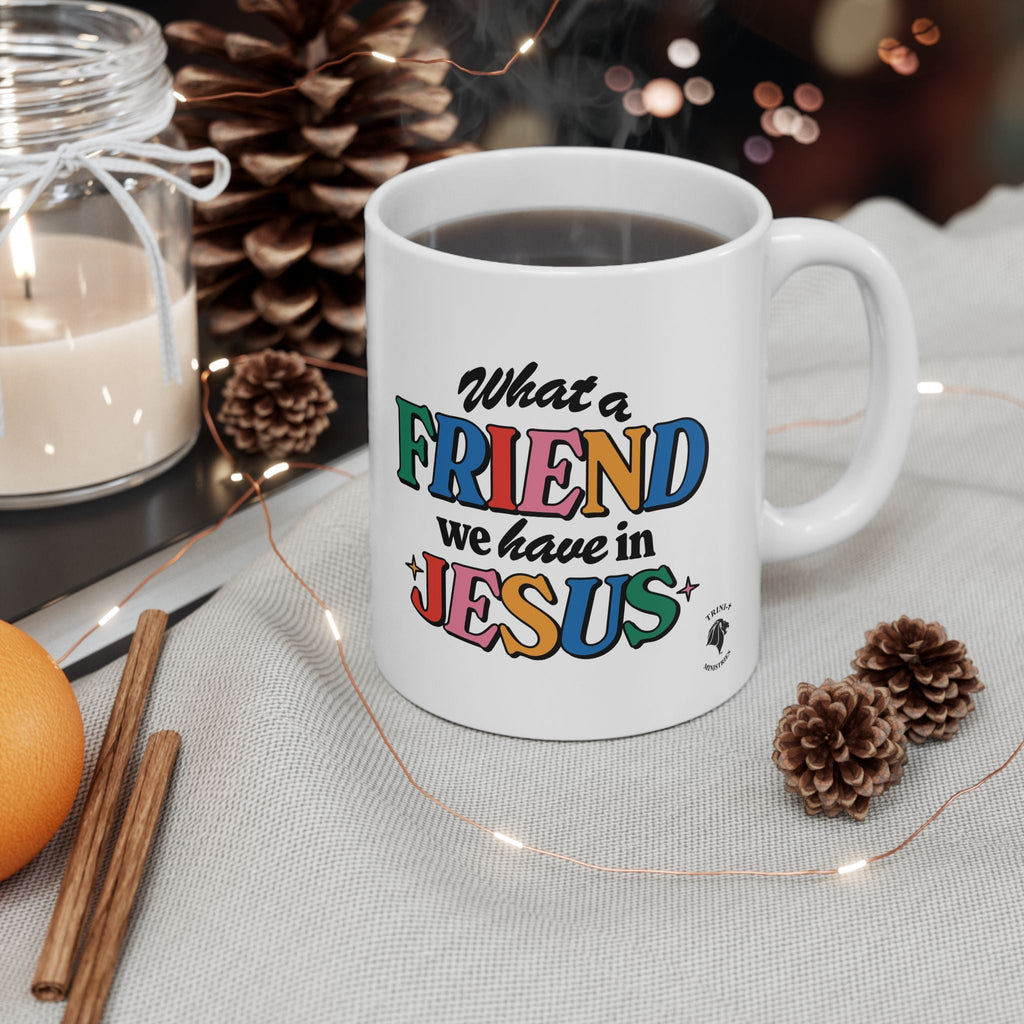 White ceramic mug with colorful text about the greatest friend, perfect Christian design