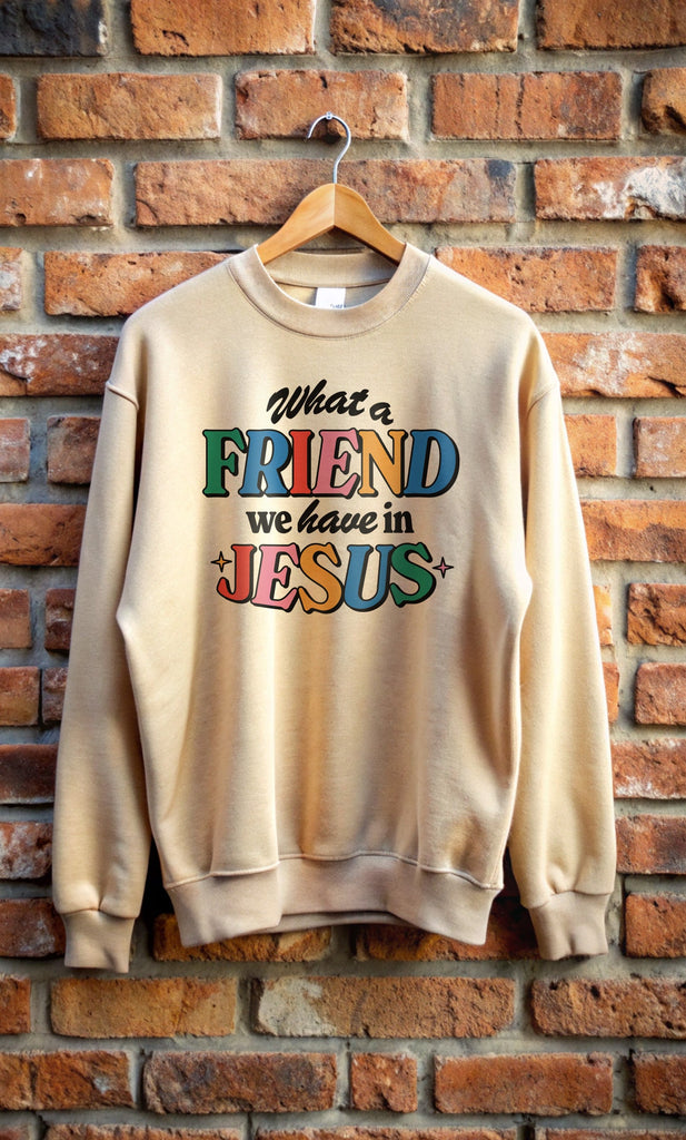 Friend in Jesus Sweatshirt hanging on brick wall.