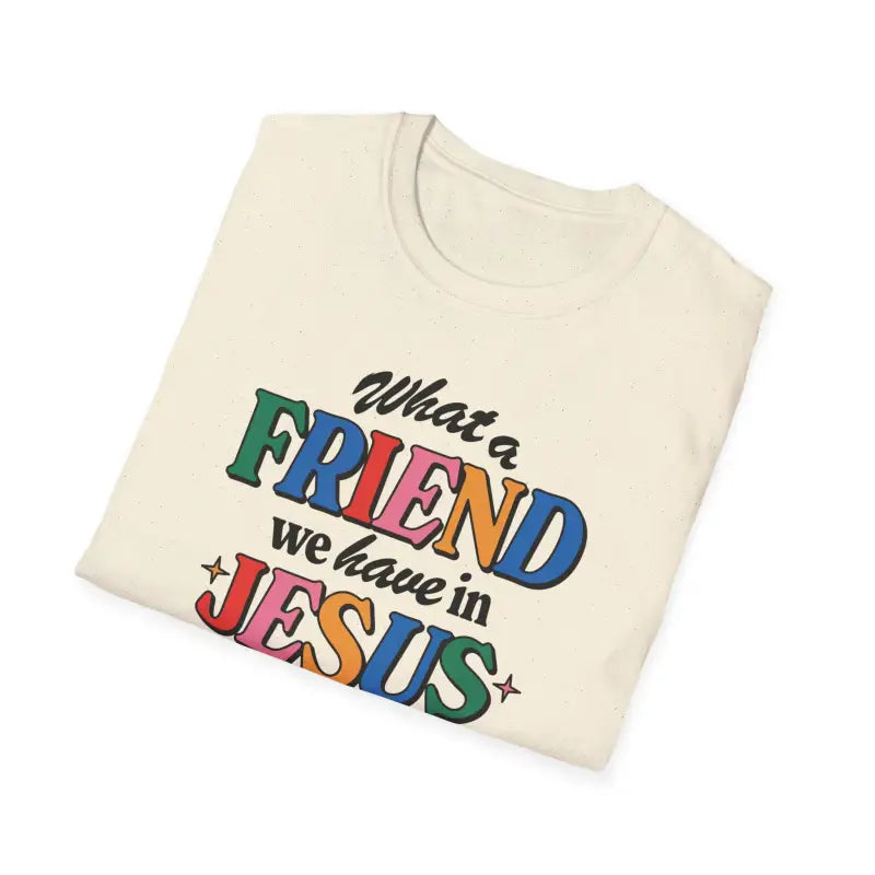 A close-up of a folded Natural colored Friend in Jesus T-shirt.