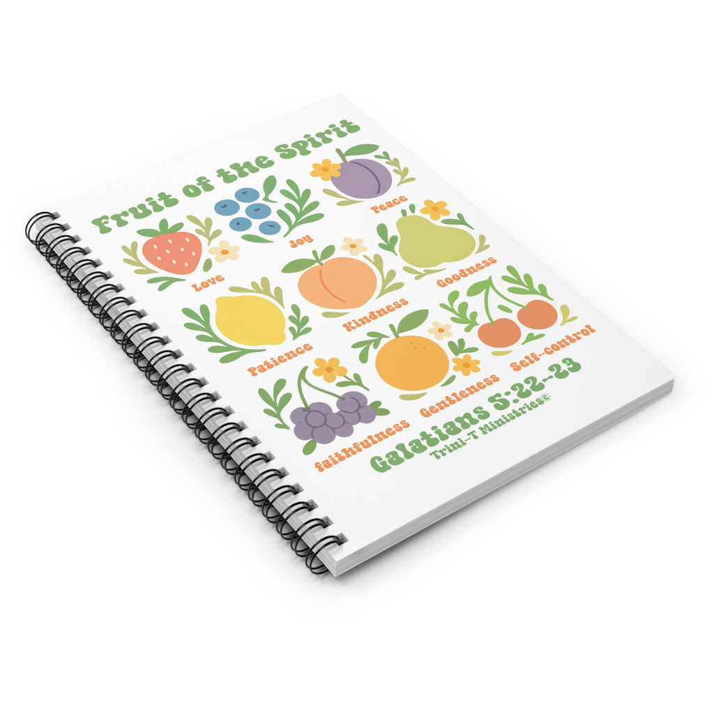 Flat lay of the Fruit of the Spirit Journal with spiral binding on the left and colorful cover design clearly visible.