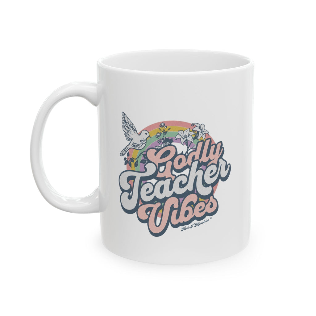 A studio shot of the front of a 11oz ceramic mug featuring the Godly Teacher Vibes from Trini-T Ministries