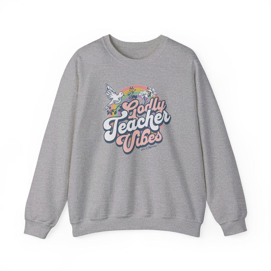 A sport gray Gildan 18000 sweatshirt featuring the Godly Teacher Vibes design from Trini-T Ministries.