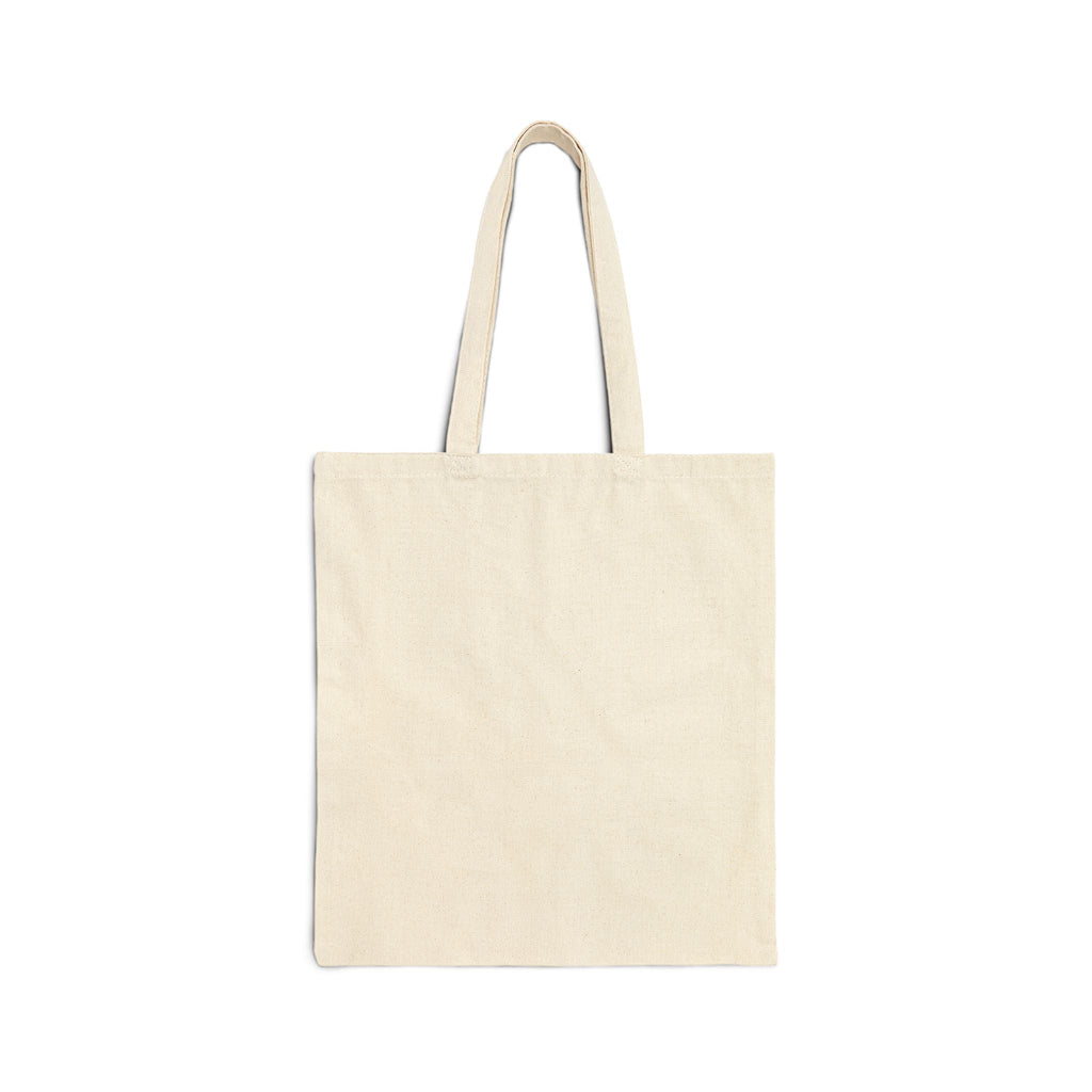 The back of a studio shot of a natural colored Tote bag that is blank.