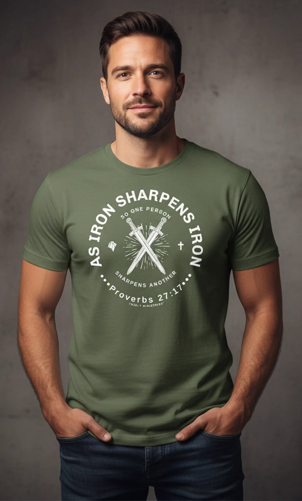 Front view of a man wearing a green "Iron Sharpens Iron" Christian t-shirt. Features Proverbs 27:17 design.