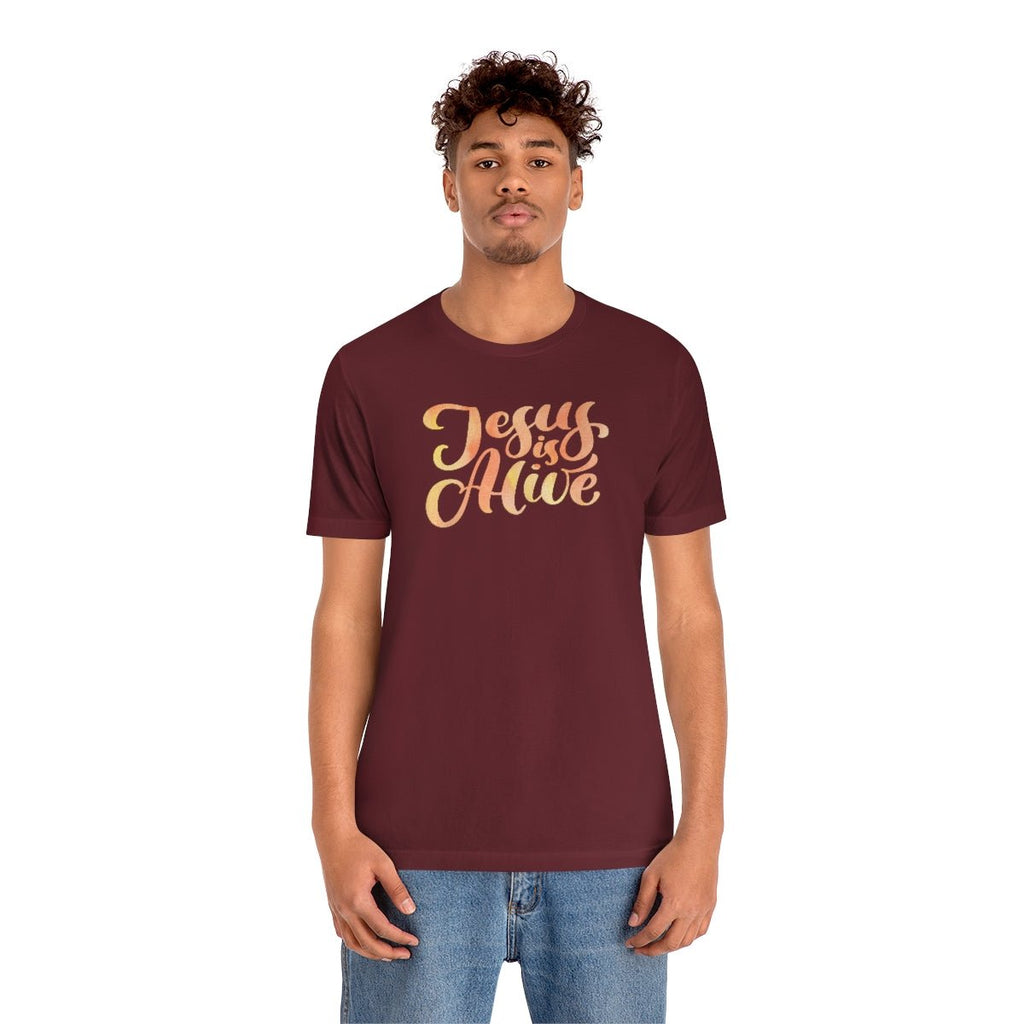 Jesus Is Alive - T -  Maroon / S, Maroon / M, Maroon / L, Maroon / XL, Maroon / 2XL, Maroon / 3XL, Black / S, Navy / S, White / S, Black / M -  Trini-T Ministries