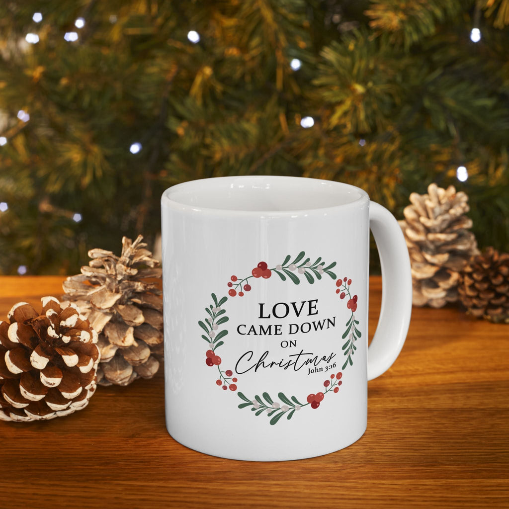 Love Came Down on Christmas - 11oz Christian Christmas Mug in front of the Christmas Tree.