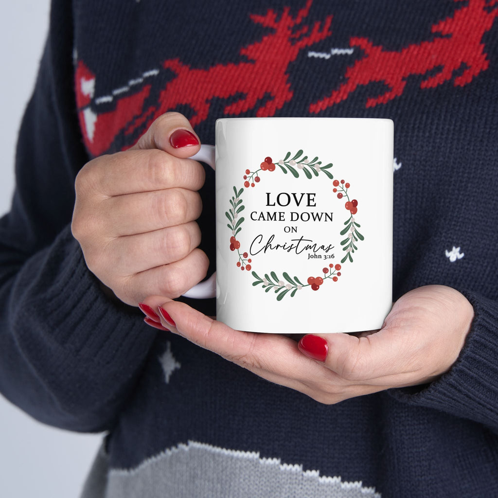 Love Came Down on Christmas - 11oz Christian Christmas Mug being held. It's the perfect Christmas Gift!