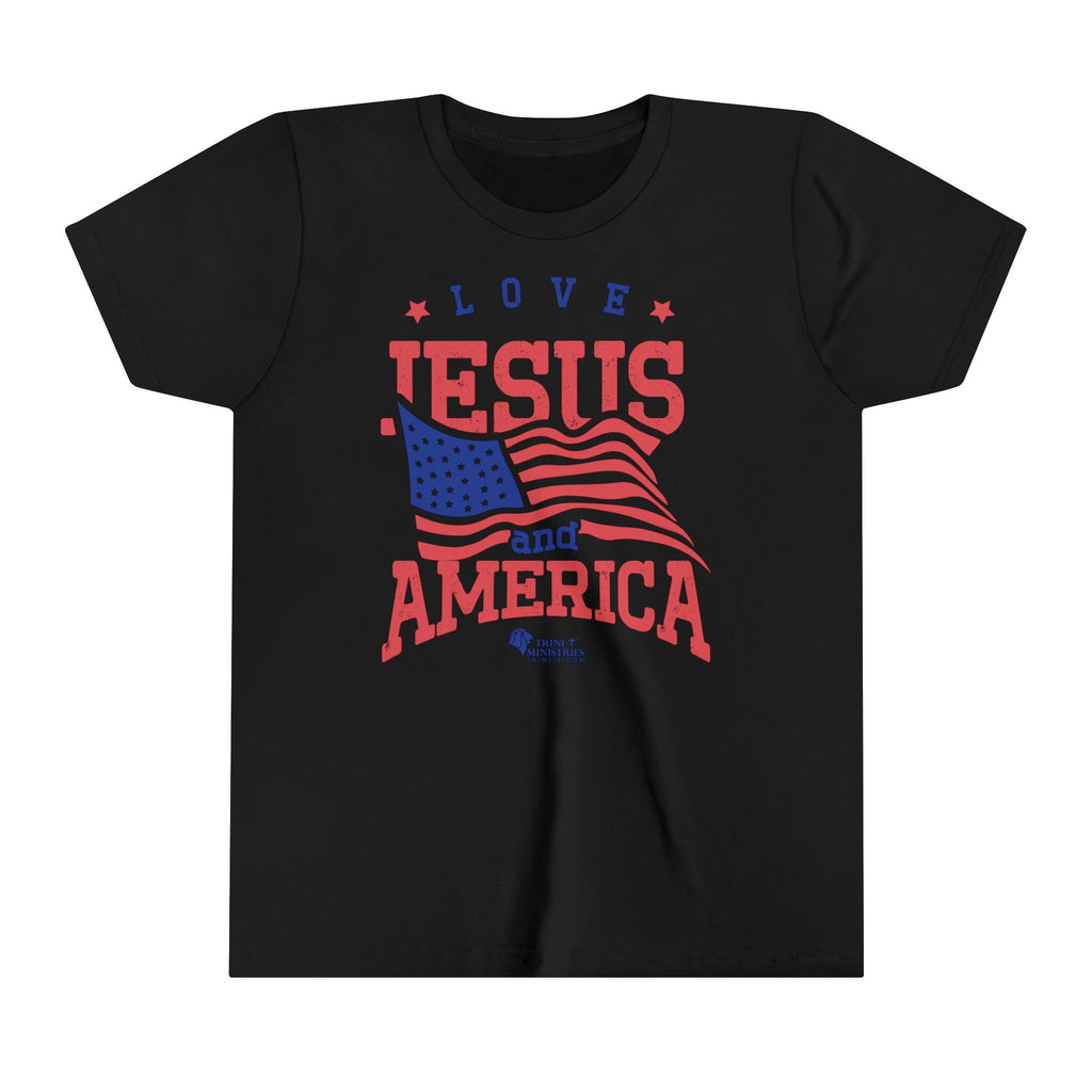 Trini-T Ministries' Love Jesus and America design on a Kid's black bella+canvas 300Y t-shirt. Showcase your children's faith and patriotism with our "Love Jesus and America" Kid's T-Shirt. This charming and inspirational graphic tee is perfect for parents, relatives, and friends who want to share the Word of God and celebrate their love for America through their children's outfit.