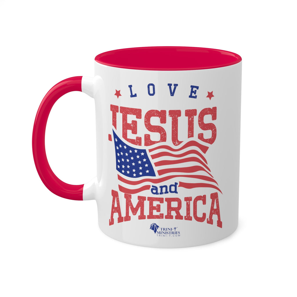 11oz White Mug with blue handle and interior handle on the left. Celebrate your faith and patriotism every morning with our "Love Jesus and America" 11oz Mug. This Christian Patriotic Ceramic Coffee Cup features a bold American flag design and the heartfelt message "Love Jesus and America," perfect for showing your love for God and country.