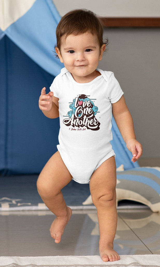 Love One Another - Baby’s Romper -  Black / 3-6m, Black / 6-12m, Black / 12-18m, Black / 18-24m, Dark Grey Heather / 3-6m, Dark Grey Heather / 6-12m, Dark Grey Heather / 12-18m, Dark Grey Heather / 18-24m, Heather Columbia Blue / 3-6m, Heather Columbia Blue / 6-12m -  Trini-T Ministries