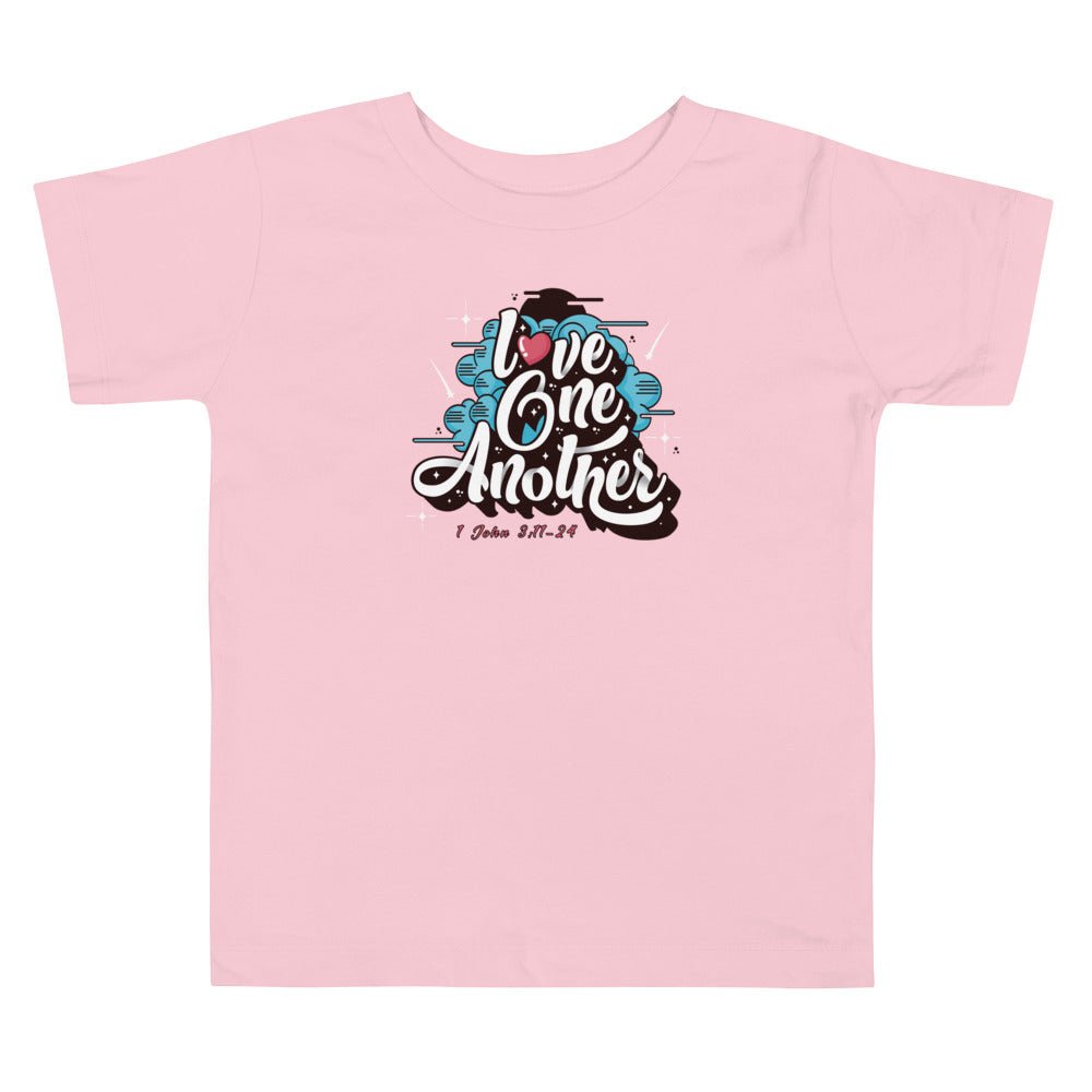 Love One Another - Toddler’s T -  Black / 2T, Black / 3T, Black / 4T, Black / 5T, Heather Columbia Blue / 2T, Heather Columbia Blue / 3T, Heather Columbia Blue / 4T, Heather Columbia Blue / 5T, Pink / 2T, Pink / 3T -  Trini-T Ministries