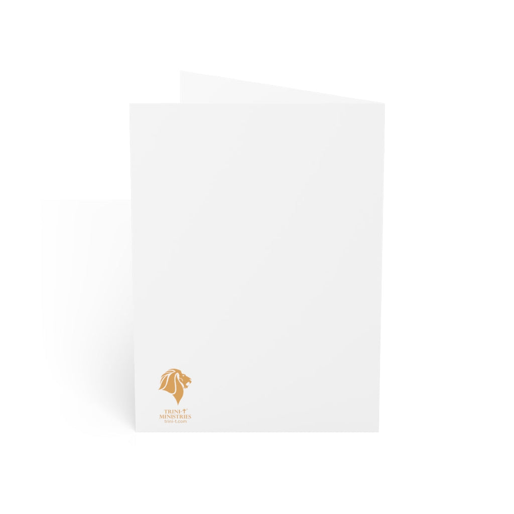 Blank white sheet of Nativity greeting cards with a small gold logo in the corner