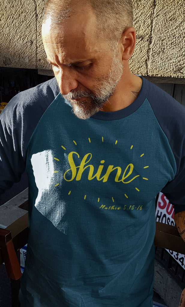 Shine - Men’s 3/4 Sleeve -  Heather Denim/Navy / XS, Heather Denim/Navy / S, Heather Denim/Navy / M, Heather Denim/Navy / L, Heather Denim/Navy / XL, Heather Denim/Navy / 2XL, Heather Grey/Black / XS, Heather Grey/Black / S, Heather Grey/Black / M, Heather Grey/Black / L -  Trini-T Ministries