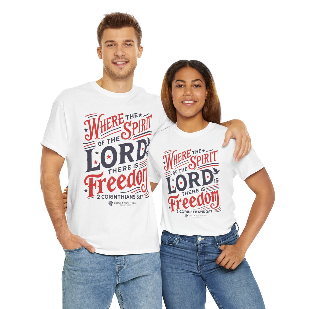 Male and female models wearing Trini-T Ministries'White t-shirt with 'Where the Spirit of the Lord is, there is freedom - 2 Corinthians 3:17' design, laying flat. Celebrate true freedom with this Christian, Scripture-inspired patriotic tee.