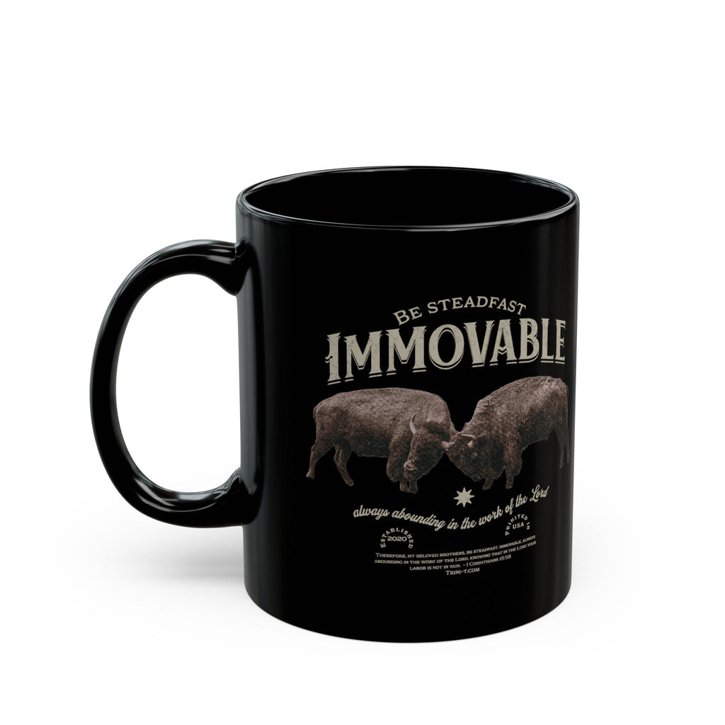 Trini-T Ministries Steadfast and Immovable - 1 Corinthians 15:53 Design on Black Mug 11oz handle on left-hand side view against white background